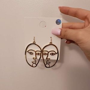 trendy face earrings